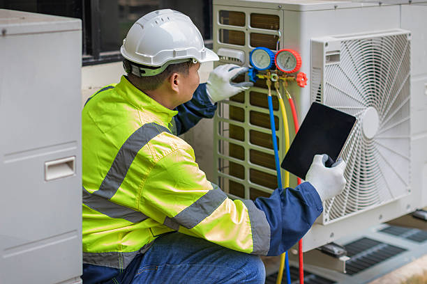 Professional Air Conditioning Repair technician working in Greenfield, MA